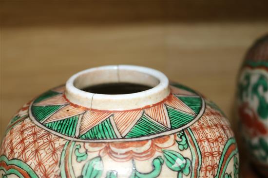 A pair of 19th century Chinese enamelled porcelain jars with wood covers and stands height 25cm